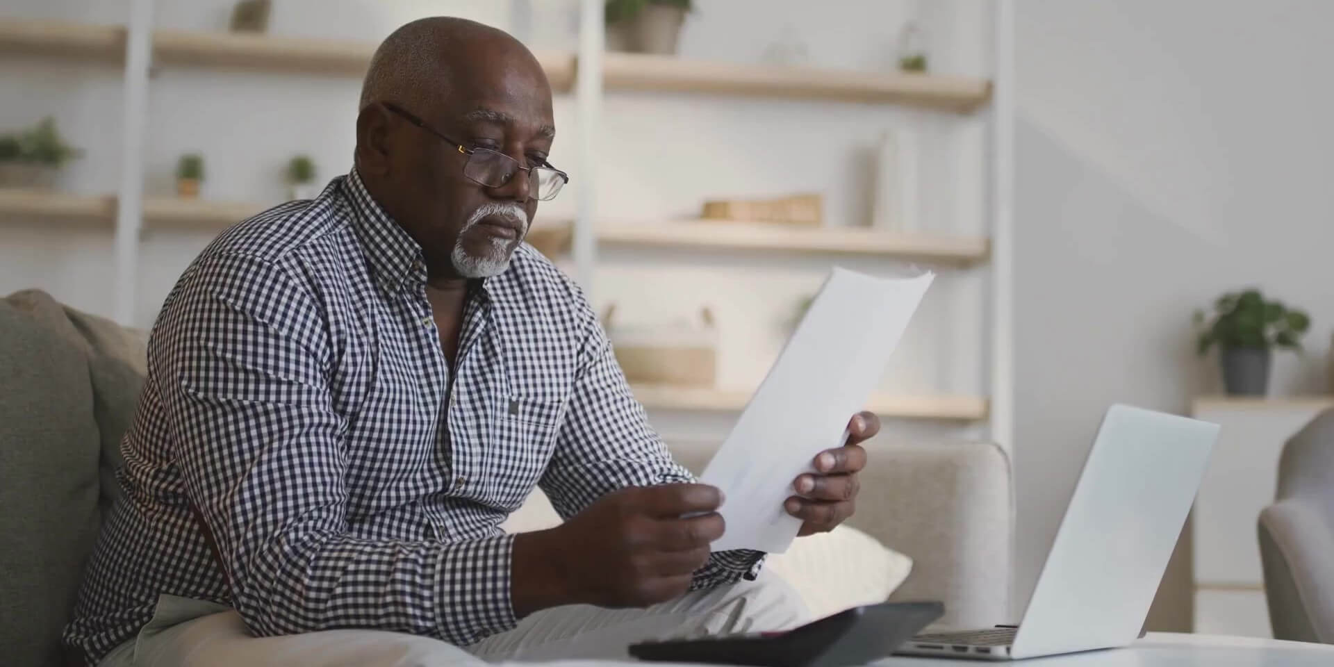 Retirement Planning Older gentleman looking at documents