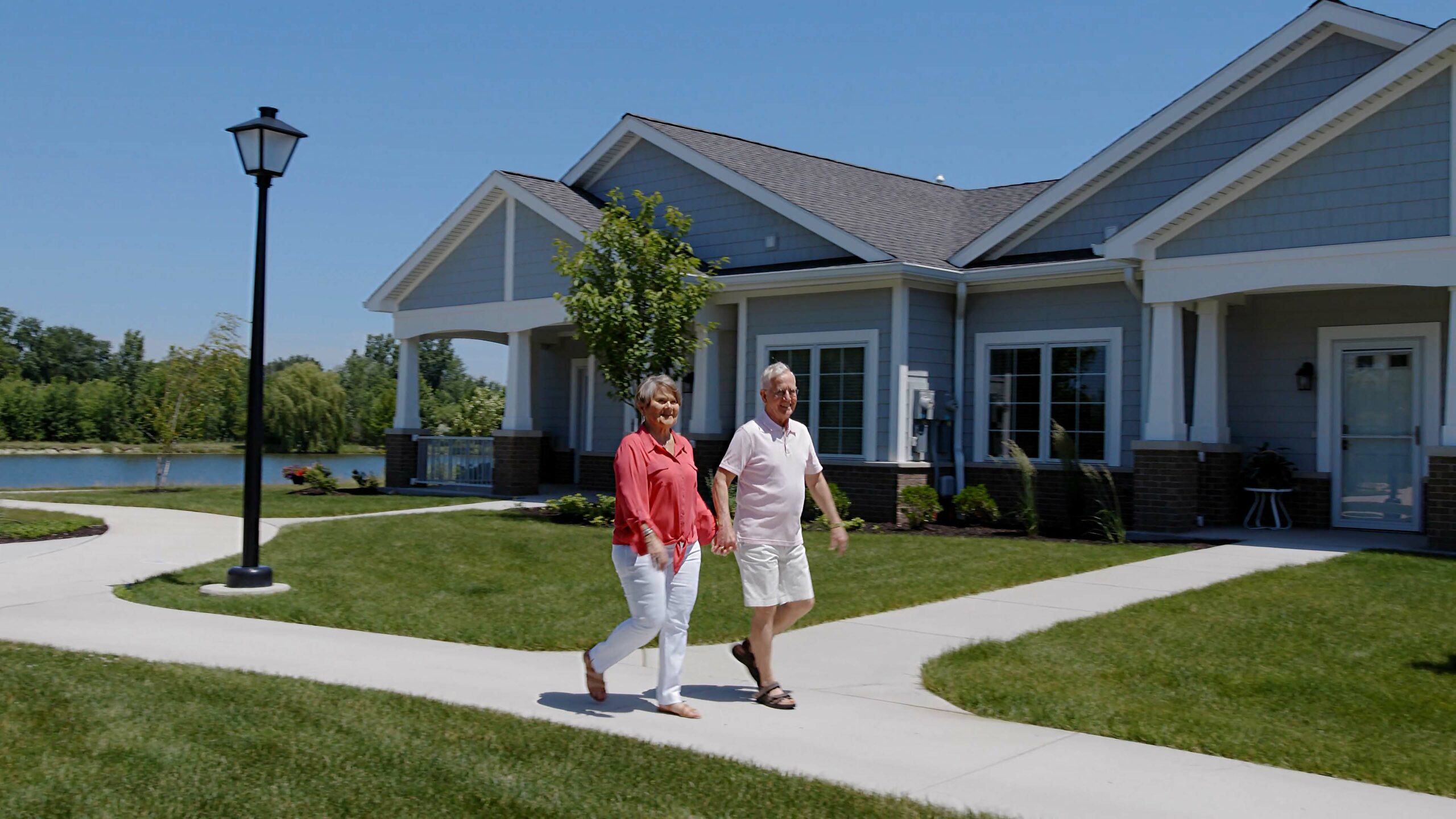 Villa Walking Path – Image 1 – Sharpened Image Residents walking through The Cove.